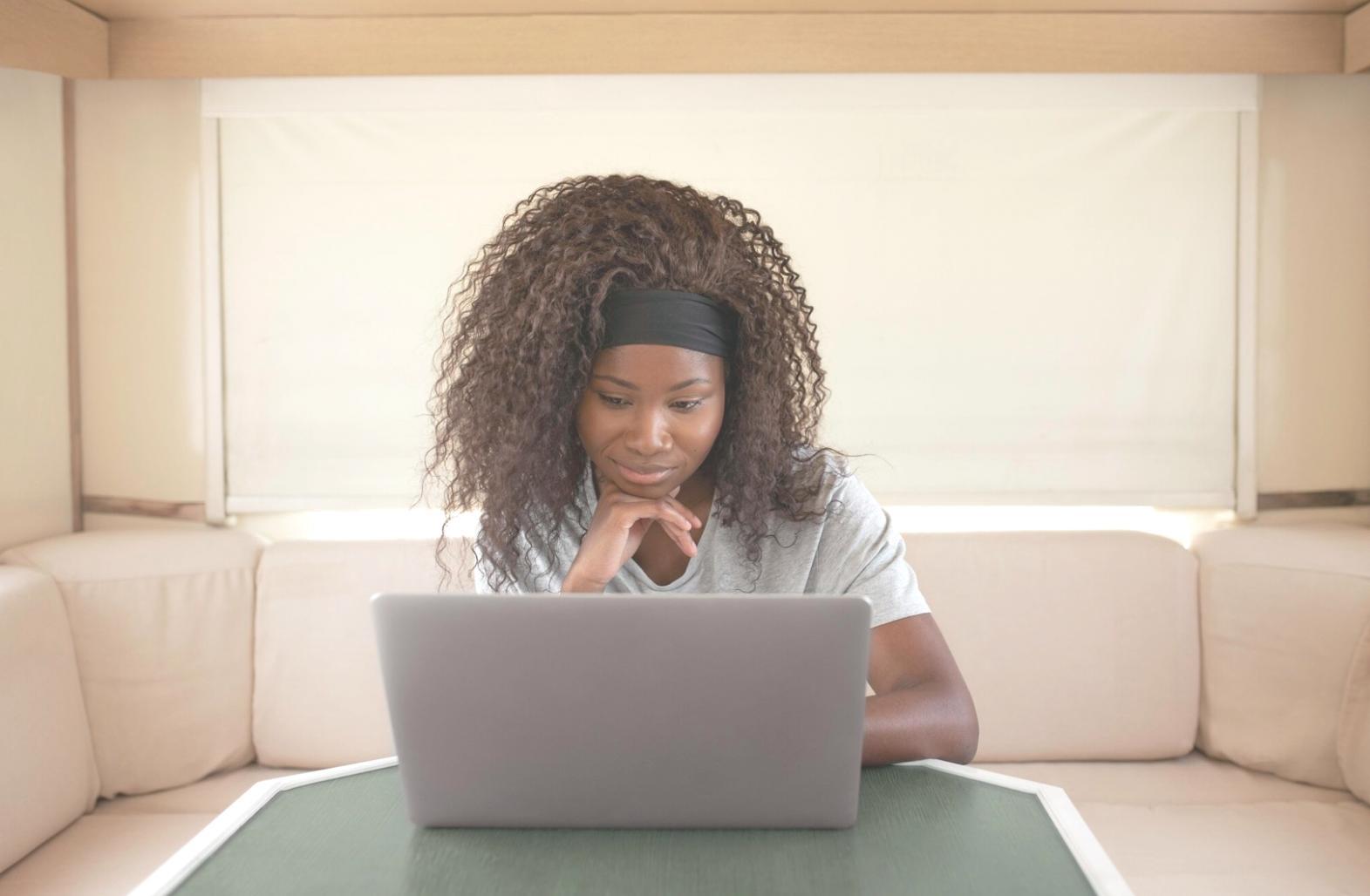 Corporate finance professional presenting quarterly analysis to executive team